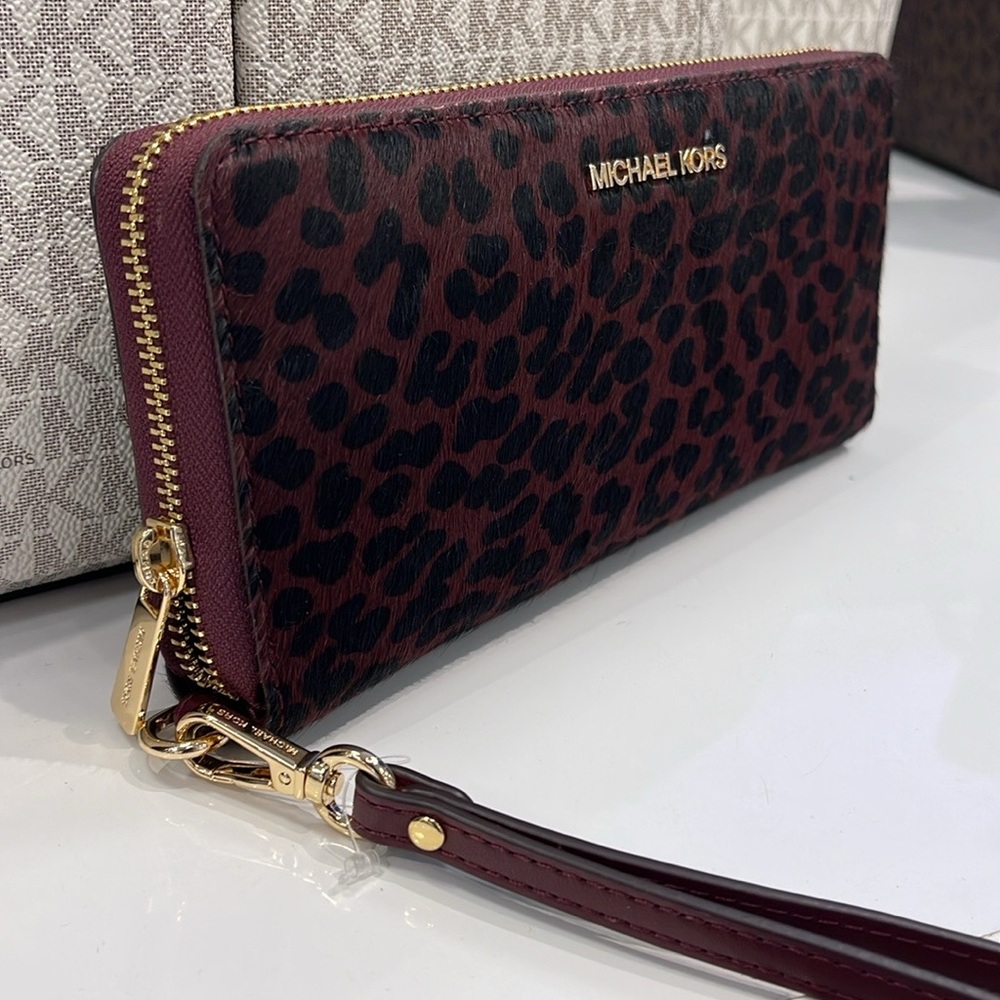 MICHAEL KORS
Leather Lg Continental Wristlet Case Wallet Exotic Print Hair Culf - Picture 13 of 16